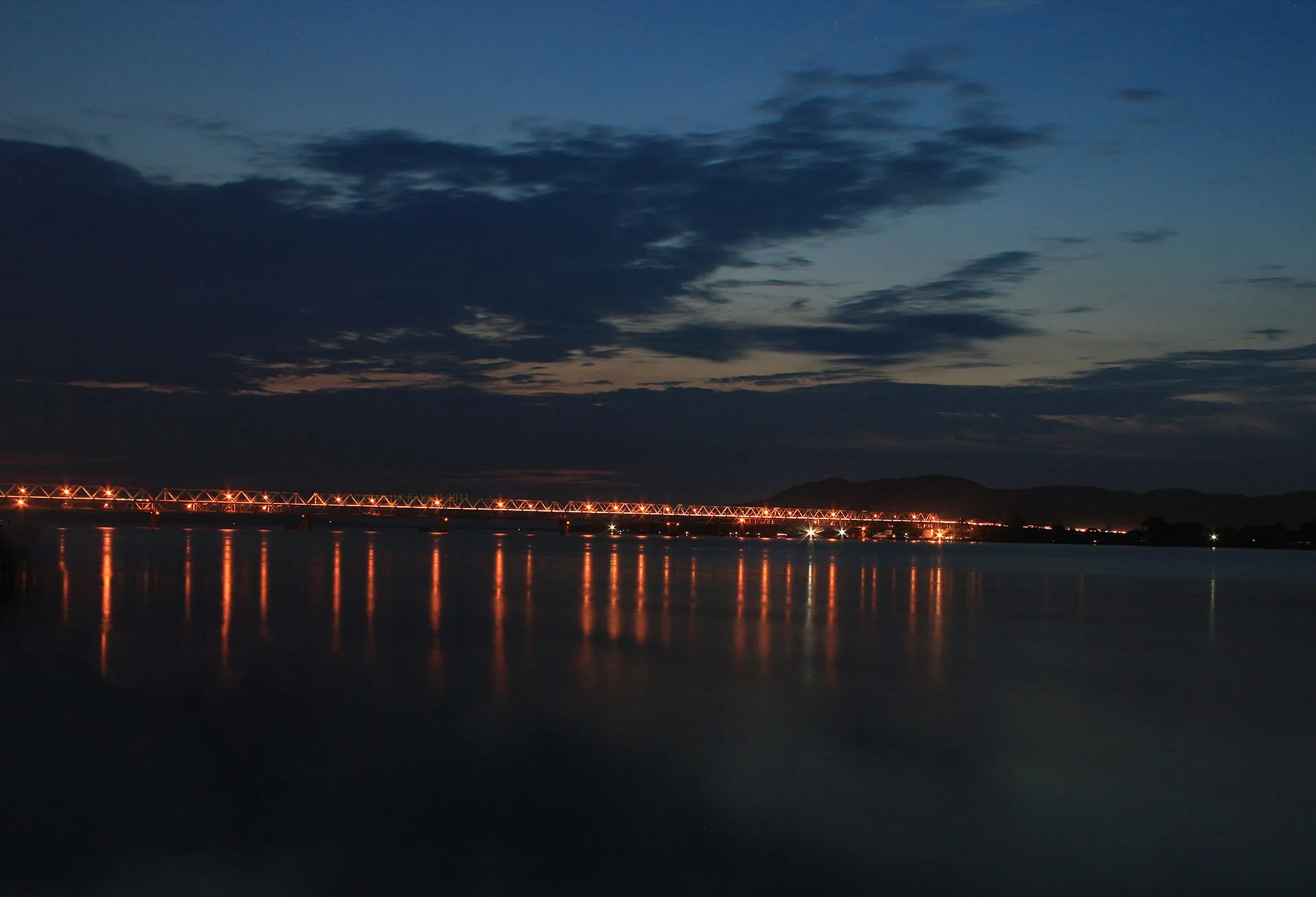 Saraighat Bridge lit up at night across the Brahmaputra river in Guwahati